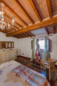 Postel nebo postele na pokoji v ubytování Casa il Castello