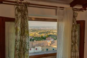 Nespecifikovaný výhled na destinaci Gambassi Terme nebo výhled na město při pohledu z apartmánu