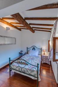 Postel nebo postele na pokoji v ubytování Casa il Castello