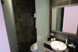 Koupelna v ubytování iLiving B&B