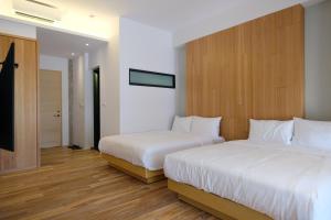 Postel nebo postele na pokoji v ubytování iLiving B&B