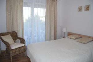 Posteľ alebo postele v izbe v ubytovaní Apartament Piaskowy Polanki Park