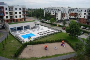 Bazén v ubytovaní Apartament Piaskowy Polanki Park alebo v jeho blízkosti