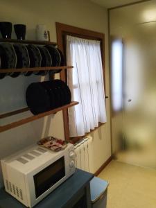 Kuchyň nebo kuchyňský kout v ubytování Apartamentos Nuncio Viejo