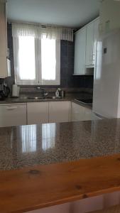 Kuchyňa alebo kuchynka v ubytovaní Townhouse Mar y Sol