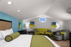 Letto o letti in una camera di Silver Palms Inn