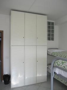 A bed or beds in a room at Star Hostel