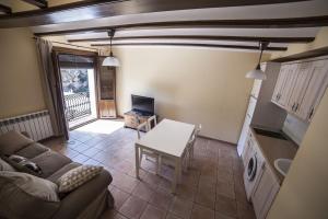 Zona de estar de Apartamentos Cine Capicol