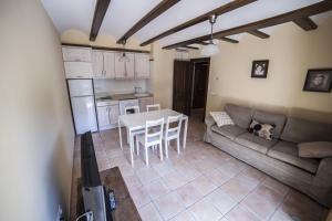 Una cocina o zona de cocina en Apartamentos Cine Capicol