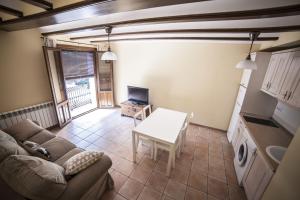 Zona de estar de Apartamentos Cine Capicol