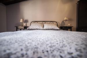 Cama o camas de una habitación en Apartamentos Cine Capicol
