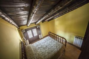 Cama o camas de una habitación en Apartamentos Cine Capicol
