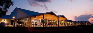 a building with a lot of windows at night at Yarrawonga Mulwala Golf Club in Yarrawonga