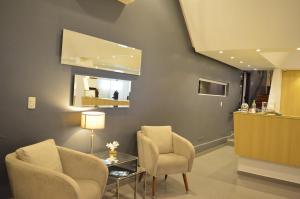 Χώρος καθιστικού στο Hotel Puesta del Sol by Nobile