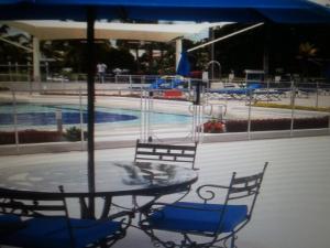 Bazén v ubytování HERMOSA CASAQUINTA FAMILIAR CONDOMINIO CAMPESTRE EL PEÑON Piscina Privada Campo de Golf nebo v jeho okolí