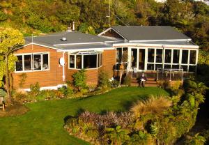 an aerial view of a house with a garden at Sails Ashore Lodge in Half-moon Bay