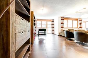 TV a/nebo společenská místnost v ubytování Gartenferienwohnung Ski In by A-Appartments