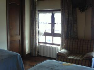 Postel nebo postele na pokoji v ubytování Casa Rómulo