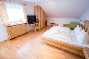 Postel nebo postele na pokoji v ubytování Hotel Schaider