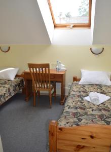 Postel nebo postele na pokoji v ubytování Hotel Tukums