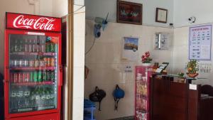 a cocacola soda vending machine in a restaurant at Hai Hien Guesthouse in Phú Quốc