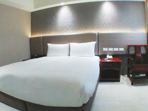 Letto o letti in una camera di KDM Hotel