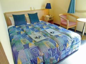 Postel nebo postele na pokoji v ubytování Hotel A.P