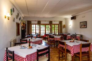 A restaurant or other place to eat at Hostal Casa Manolo