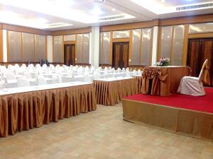 a large room with white tables and chairs at Kireethara Boutique Resort in Chiang Mai +93 photos