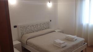 Posteľ alebo postele v izbe v ubytovaní Don Diego Apartment Orosei