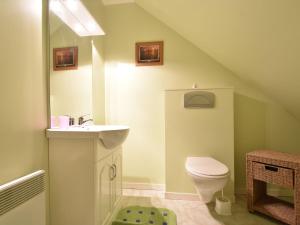 a bathroom with a sink and a toilet at Family Stay in Normandy in Villedieu-les-Poëles +32 photos