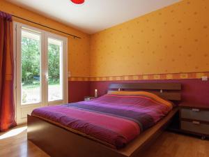 a bedroom with a bed and a window at Peaceful Villa in Calamane with Private Pool in Calamane