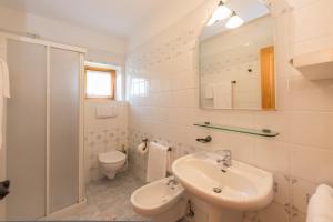 Koupelna v ubytování Residence Rio Piccolo + 22 fotografií