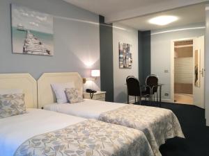 Postel nebo postele na pokoji v ubytování First Euroflat Hotel