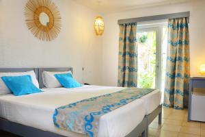 Cocotiers Hotel – Mauritius 객실 침대