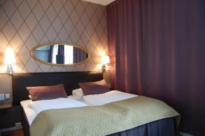 Postel nebo postele na pokoji v ubytování Thon PartnerHotel Skagen