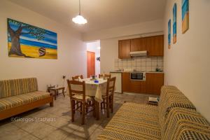A kitchen or kitchenette at Roula Apartments