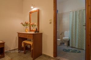 A bathroom at Roula Apartments