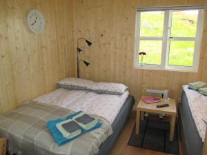 Postel nebo postele na pokoji v ubytování Lækjaborgir Guesthouse