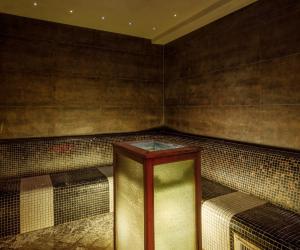 a room with a bed and a table in it at Meresuu Spa & Hotel in Narva-Jõesuu