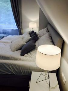 Postel nebo postele na pokoji v ubytování Apartamenty Platinum