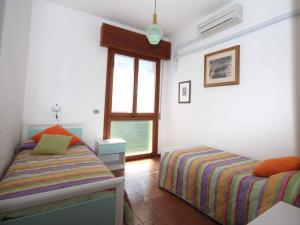 Posteľ alebo postele v izbe v ubytovaní Villa Liliana + 3 fotografie