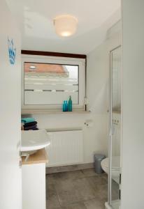 Ванная комната в Apartmenthaus Kornstrasse