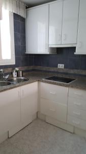 Kuchyňa alebo kuchynka v ubytovaní Townhouse Mar y Sol