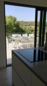 A balcony or terrace at Villa las Colinas Golf Resort