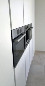 A kitchen or kitchenette at Villa las Colinas Golf Resort