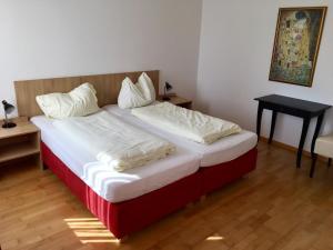 เตียงในห้องที่ Apfelwirt