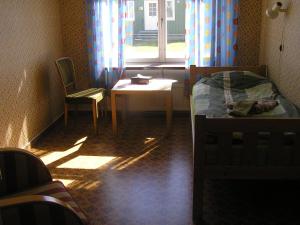 Postel nebo postele na pokoji v ubytování Fredrika Hotell Jakt&Fiskecamp