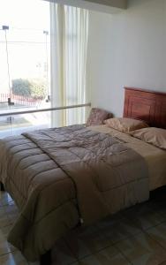 Cama o camas de una habitación en Hotel Brunning