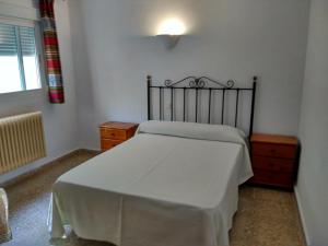 Postel nebo postele na pokoji v ubytování Pensión Rural Arroyo la Teja